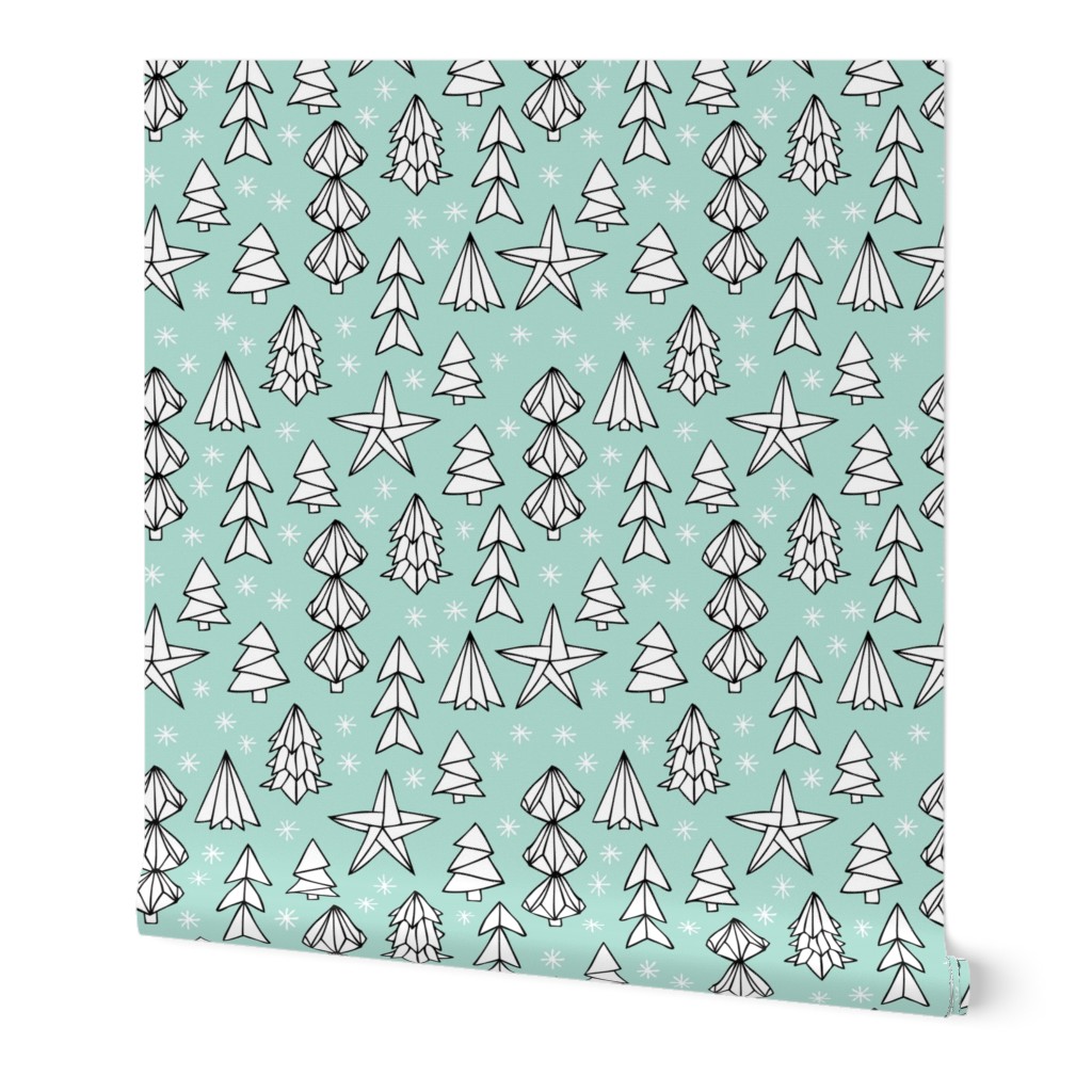 Christmas trees and origami decoration stars seasonal geometric december holiday design mint blue