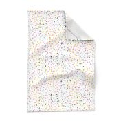 Watercolor rainbow dots in white