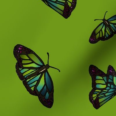 Butterflies on green background