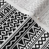 Geometric monochrome strokes zigzag lines and triangle dots aztec patchwork back and white