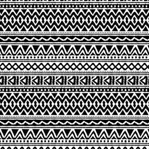 Geometric monochrome strokes zigzag lines and triangle dots aztec patchwork back and white