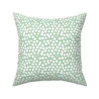 Pastel love brush circles, spots and dots and spots hand drawn ink illustration pattern scandinavian style in soft mint green