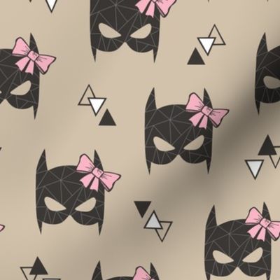 Girly Geometric Bat Mask with Pink Bow on Almond