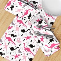 Adorable dino girls fabric with black and pink dinosaur geometric triangles and funky animal illustration theme for kids