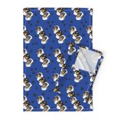 Collies with blue background with paw prints