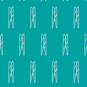 clothespins in a turquoise blue sky
