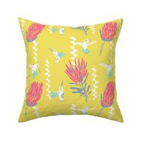 Protea and hummingbird in yellow