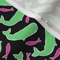 Green whales and pink fish on black