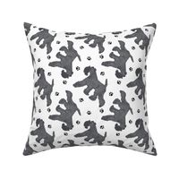 Trotting Kerry Blue Terrier and paw prints - white