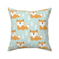 foxes on soft turquoise