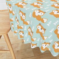 foxes on soft turquoise