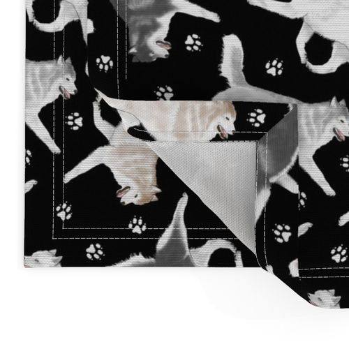 Trotting Siberian Husky and paw prints - black