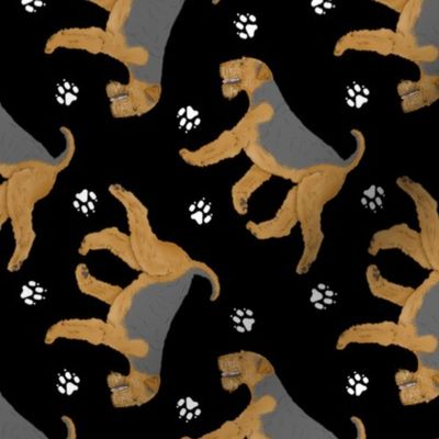 Trotting Airedale Terrier and paw prints - black