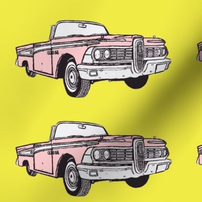 pink 1959 Edsel Corsiar convertible w top down on yellow background