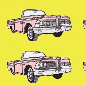 pink 1959 Edsel Corsiar convertible w top down on yellow background