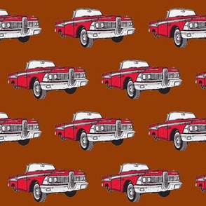 Red 1959 Edsel Corsair convertible on brown background
