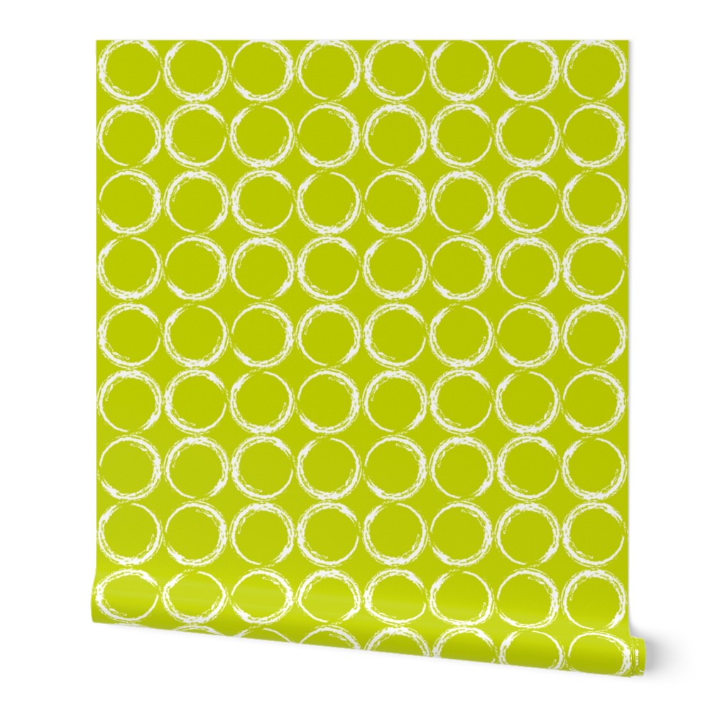 Circles in a geometric pattern on lime green background