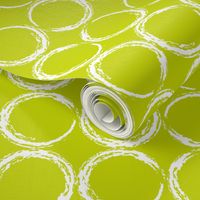 Circles in a geometric pattern on lime green background