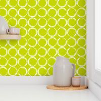 Circles in a geometric pattern on lime green background