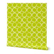 Circles in a geometric pattern on lime green background
