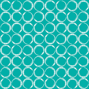 Circles in a geometric pattern on turquoise background