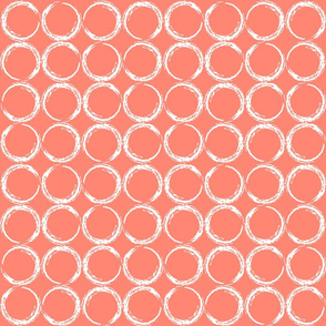 Circles in a geometric pattern on coral background
