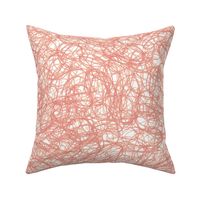 seamless crayon scribbles in coral pink and pale peach