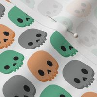 Orange, green and grey skulls