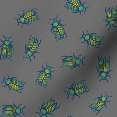 iridescent beetles on grey