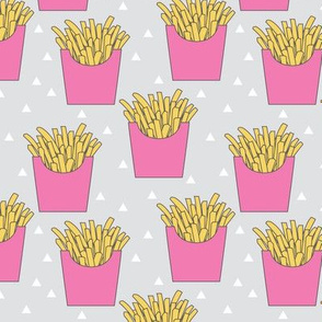 french-fries-with-pink-box-on-grey