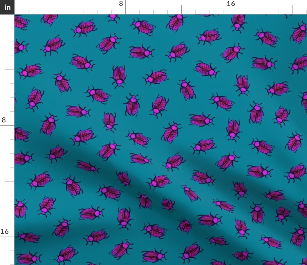 magenta beetles on teal