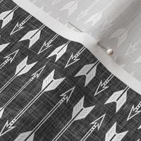 arrows on dark grey linen