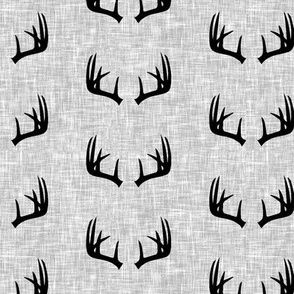 black antlers on light grey linen (small scale)