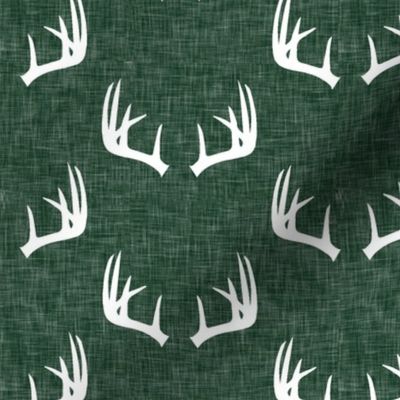 antlers on hunter green linen