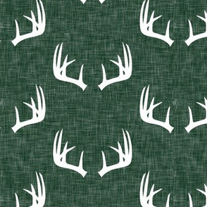 antlers on hunter green linen