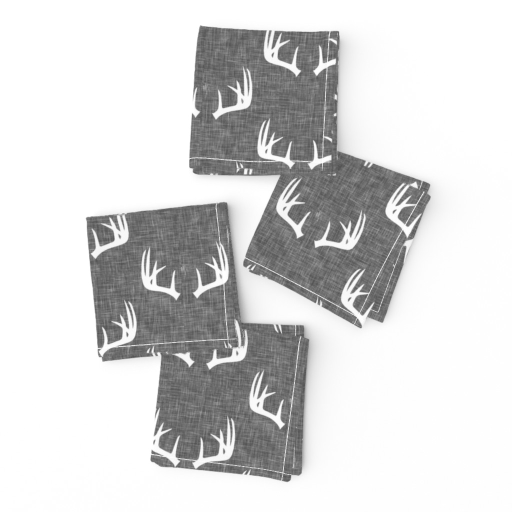 antlers on grey linen