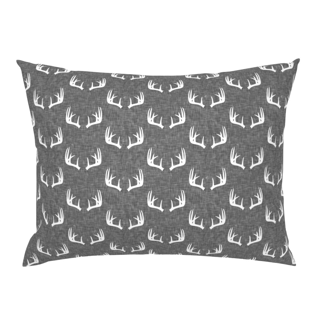 antlers on grey linen