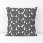 antlers on grey linen