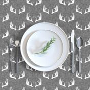 antlers on grey linen