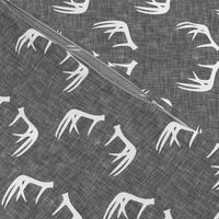 antlers on grey linen