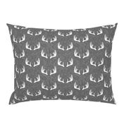 antlers on grey linen