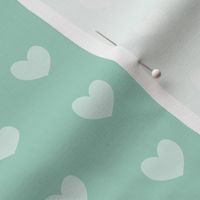 teal heart on mint