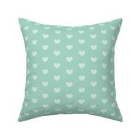 teal heart on mint