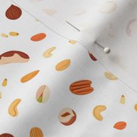  Various healthy nuts pattern on white background