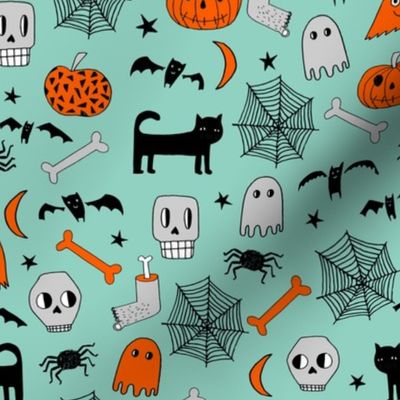 halloween // mint and orange halloween skull pumpkin bat spider spiderwebs ghosts bats andrea lauren fabric