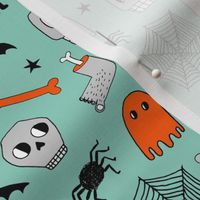 halloween // mint and orange halloween skull pumpkin bat spider spiderwebs ghosts bats andrea lauren fabric