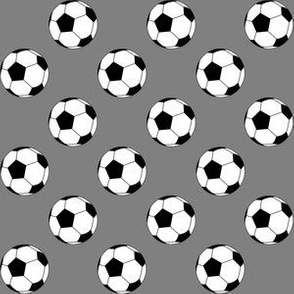 One Inch Black and White Soccer Balls on Medium Gray