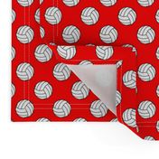 One Inch Black and White Volleyballs on Red