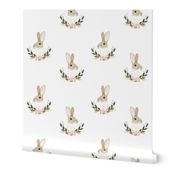 Whimsical rabbit on plain white