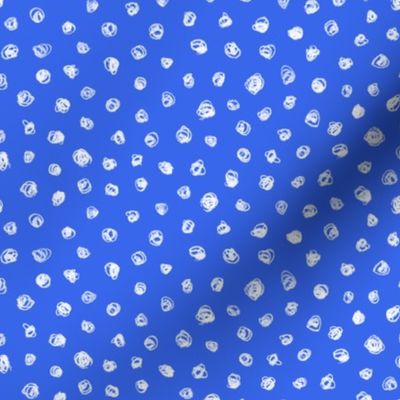 white chalk polkadots on cobalt blue